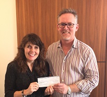 Carol and Mike Smiley with cheque - 2017.