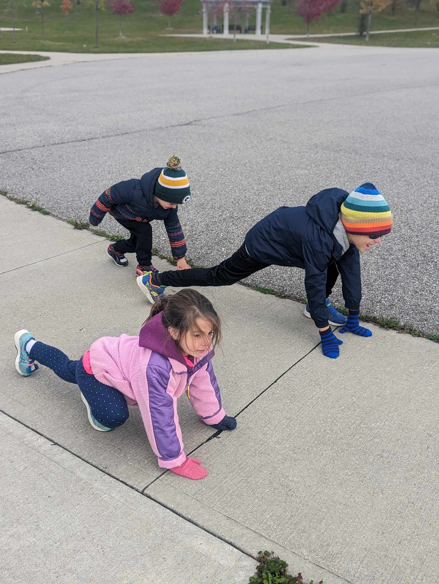 three children in race starting position