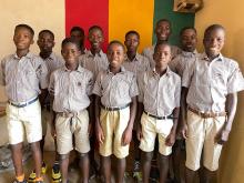 Smiling Junior High School boys smartly wearing new uniforms